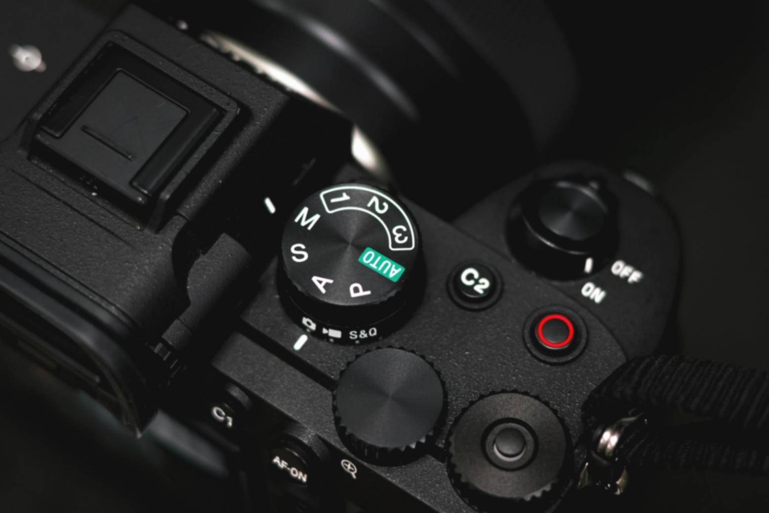 Student reviewing audio waveform analysis on computer screen with notation tools